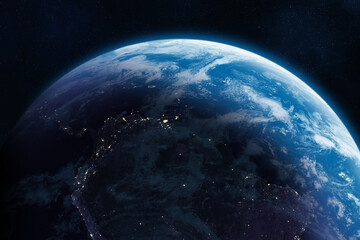 Earth planet in outer space. South America at night viewed from space with city lights. Colombia, Venezuela, Brazil, Panama at night viewed from space, high resolution image. Nightly Earth. 