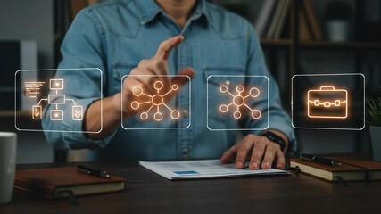 Digital transformation displayed as a focused adult man engages with a futuristic virtual interface, analyzing business data and networking concepts for innovation in a modern office environment. - Powered by Adobe