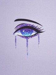 eye with glitter tears on lilac pastel background