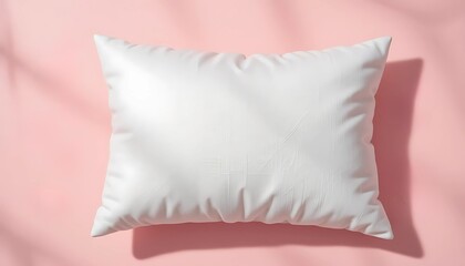 A soft, clean white pillow lying on a bright pink background with natural shadow overlays. A minimalist and elegant image ideal for bedding, home decor, comfort, and sleep-related product mockups 