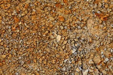 irregular pattern of textured stones and minerals in the mine