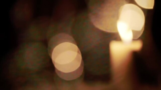 Candle light in dark interior