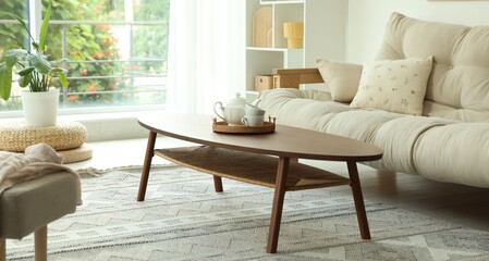 Coffee table, sofa and decor in dining room. Interior design