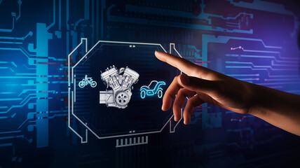 Finger interacts with digital blueprint of an engine