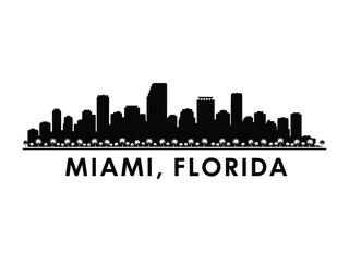 Miami Skyline Silhouette: A striking monochrome representation of the Miami skyline, with its iconic buildings silhouetted against the sky.  