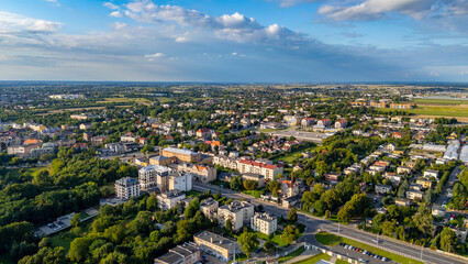 Obraz premium Drone panorama of Kalisz, showing residential districts, green spaces, and road infrastructure. A modern look at the oldest city in Poland.