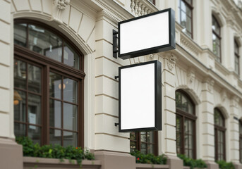 Signboard poster mockup on a facade of the building, blank space to display your advertising or branding campaign