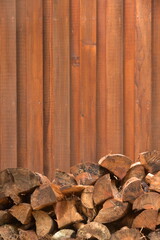 Woods wall in monotone with fire woods piles.	