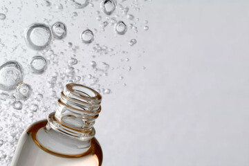 Cosmetic bottle releasing oxygen bubbles in water
