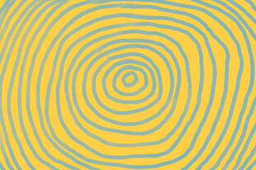 Colorful concentric circles create a lively pattern on a bright yellow background in a modern design inspired setting