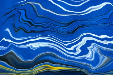 Fototapeta premium Colorful wavy abstract pattern with blue, white, and yellow hues flowing in various directions