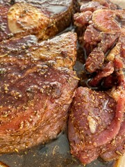 Raw veal and lamb in aromatic marinade