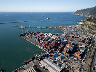 Italy, Campania, Port of Salerno. U.S. tariffs: Container ship and container blocks departing from the port of Salerno.