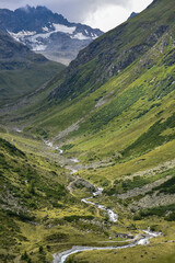 view of the alpine valley leading to the F&uuml;elapass Fuorcla da Lavaz in the Swiss Alps
