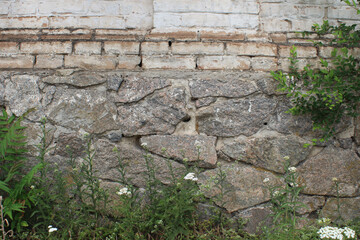 Stone foundation and brick wall