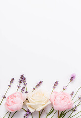 White rose wedding background in vertical format, white background, pastel tones, pink lavender accent, border wide copy space for banner, packaging, wedding invitation, white rose wedding background