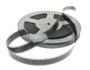 Unwinding Metal Film Reel with Loose Film Strip, isolated on a transparent background