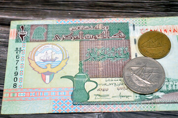 Kuwaiti old coins on Kuwaiti half dinar features coat of arms of Kuwait, vignette of Kuwaiti money...
