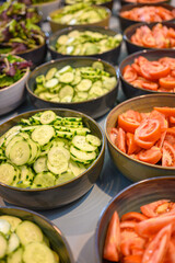 Preparation of ingredients for a fresh salad in a restaurant kitchen catering concept