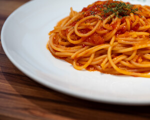 Close-up of Spaghetti with Tomato Sauce on White Plate