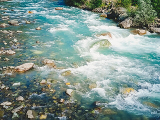 A close-up of a seething mountain river.