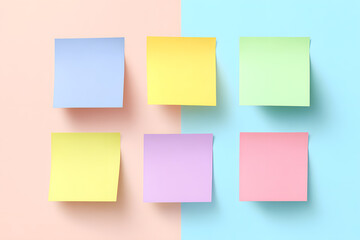 Fototapeta premium Colorful sticky notes arranged on pastel background, representing creativity, reminders, and office organization.