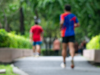 Blurred Runner, Jogger in Public Park, Active Lifestyle Background