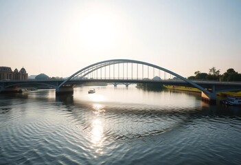 Naklejka premium Elegant arched bridge spans calm river, reflecting sun, river, bridge