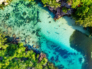 A wonderful vacation, swimming in a lake that felt like my own private pool, encircled by solid coral cliffs in South Sumba's sea
