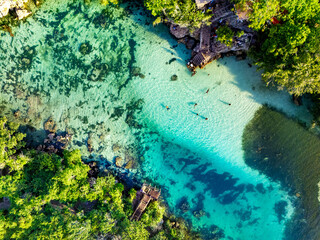 A wonderful vacation, swimming in a lake that felt like my own private pool, encircled by solid coral cliffs in South Sumba's sea
