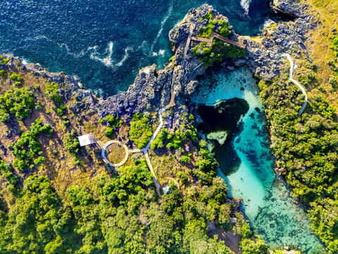 A wonderful vacation, swimming in a lake that felt like my own private pool, encircled by solid coral cliffs in South Sumba's sea