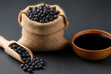 Premium Black Soybeans and Rich Soy Sauce in Wooden Bowl