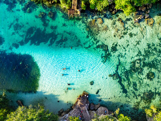 A wonderful vacation, swimming in a lake that felt like my own private pool, encircled by solid coral cliffs in South Sumba's sea