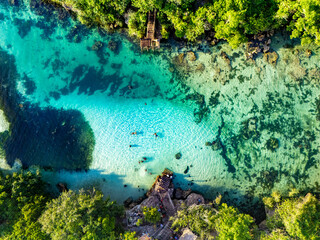 A wonderful vacation, swimming in a lake that felt like my own private pool, encircled by solid coral cliffs in South Sumba's sea