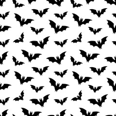 Seamless vector pattern for Halloween with black bats, on a white background. Perfect for wrapping paper, fabric, wallpaper or digital Halloween projects.