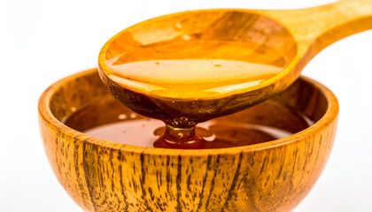 Golden Honey Resting on Rustic Wooden Spoon and White Backdrop