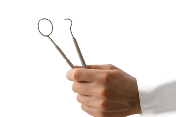 Dental mirror and hook held by bare hand in white coat on transparent background