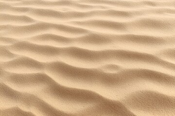 Flat lay beach sand texture background. Sea sand surface rippled sand dune. Brown sea sand background with copy space for product presentation. Minimal summer concept