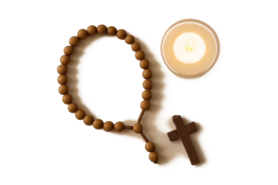 Rosary with cross next to burning candle on transparent background