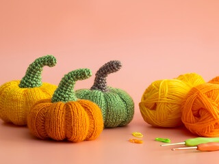 Handmade autumn crochet decor, pumpkins, leaves knitting tools. 