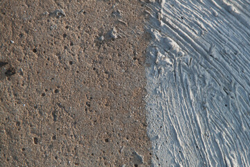 Concrete texture. Textured texture of concrete and plaster. Wall with rough texture. Old concrete