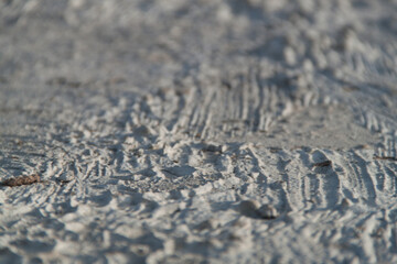 Texture of textured plaster. Coarse plaster. Texture gray textured