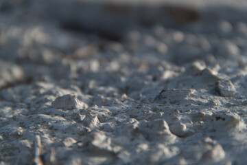 Texture of textured plaster. Coarse plaster. Texture gray textured