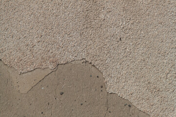 Photo of an old wall. Old wall cracked plaster. Old destroyed wall. Background of old plaster