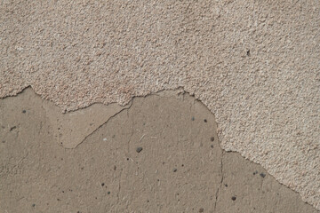 Photo of an old wall. Old wall cracked plaster. Old destroyed wall. Background of old plaster