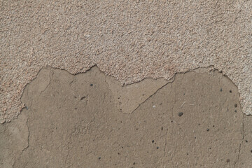 Photo of an old wall. Old wall cracked plaster. Old destroyed wall. Background of old plaster