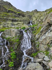 Cascada Capra (Capra Waterfall) seen from the Transfagarasan Road on a summer day. Sibiu, Romania