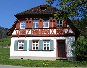 Charming, traditional European house with decorative wooden accents