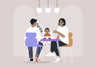 Diners share a special moment at a restaurant table, surrounded by a warm atmosphere, A child joyfully engages, bringing smiles to the dining experience.