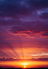 Fototapeta premium Vibrant Sunset Sky with City Silhouette